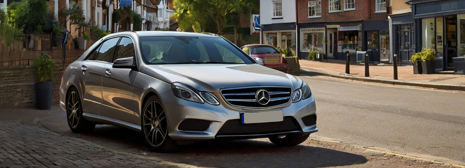 An elegant Mercedes E Class Sedan on a picturesque countryside road